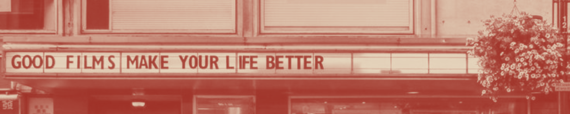 A photo of a cinema entrance with "good films make your life better" as its banner, in red monochrome tone. Original source of the picture: https://pin.it/7N0woXUP5.